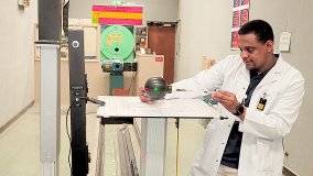 Radiation metrologist Omar Noor sets up a dosimeter for calibration in a photon beam used for radiation protection services at King Faisal Specialist Hospital and Research Center in Riyadh, Saudi Arabia